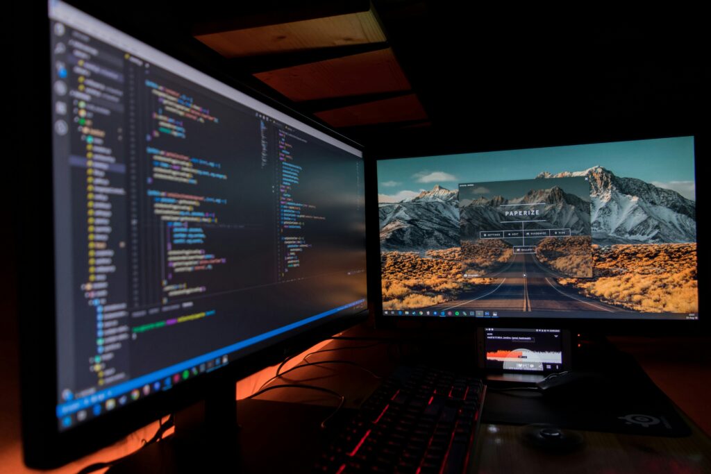 A laptop screen filled with lines of program code